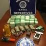 Authorities seized alleged drugs and paraphernalia.